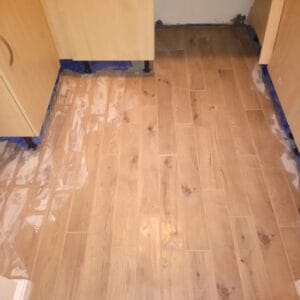 Wood effect porcelain plank tiles in a kitchen