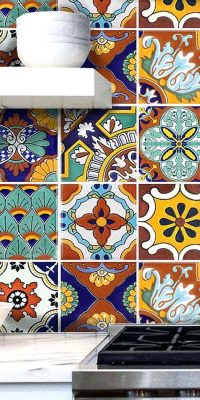 Small multi-coloured ceramic tiles used as a kitchen splashback